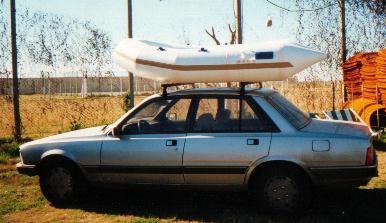 MOON 310 dinghy Rib in car's Roof