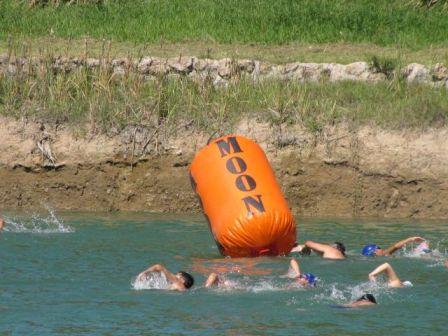 MOON inflatable buoys posters advertising via public advertisements campaigns. regatas, sport events, triathlon, swimming, sail, powerboating, etc